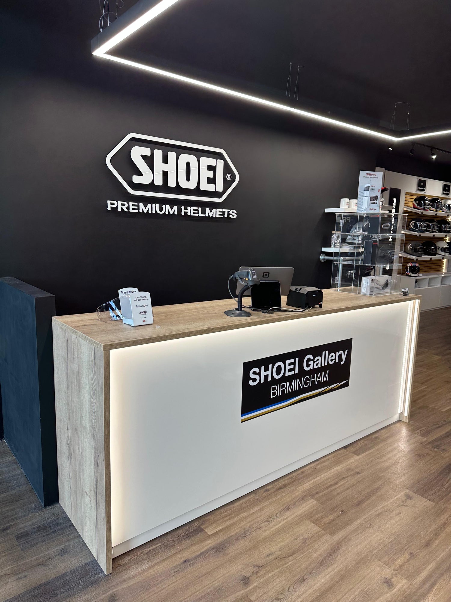 Inside SHOEI Gallery Birmingham showing the full helmet range